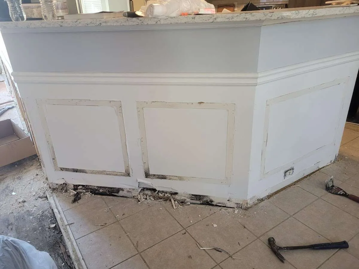 Water damage and mold on kitchen during Sewage Cleanup & Sanitation in Narragansett